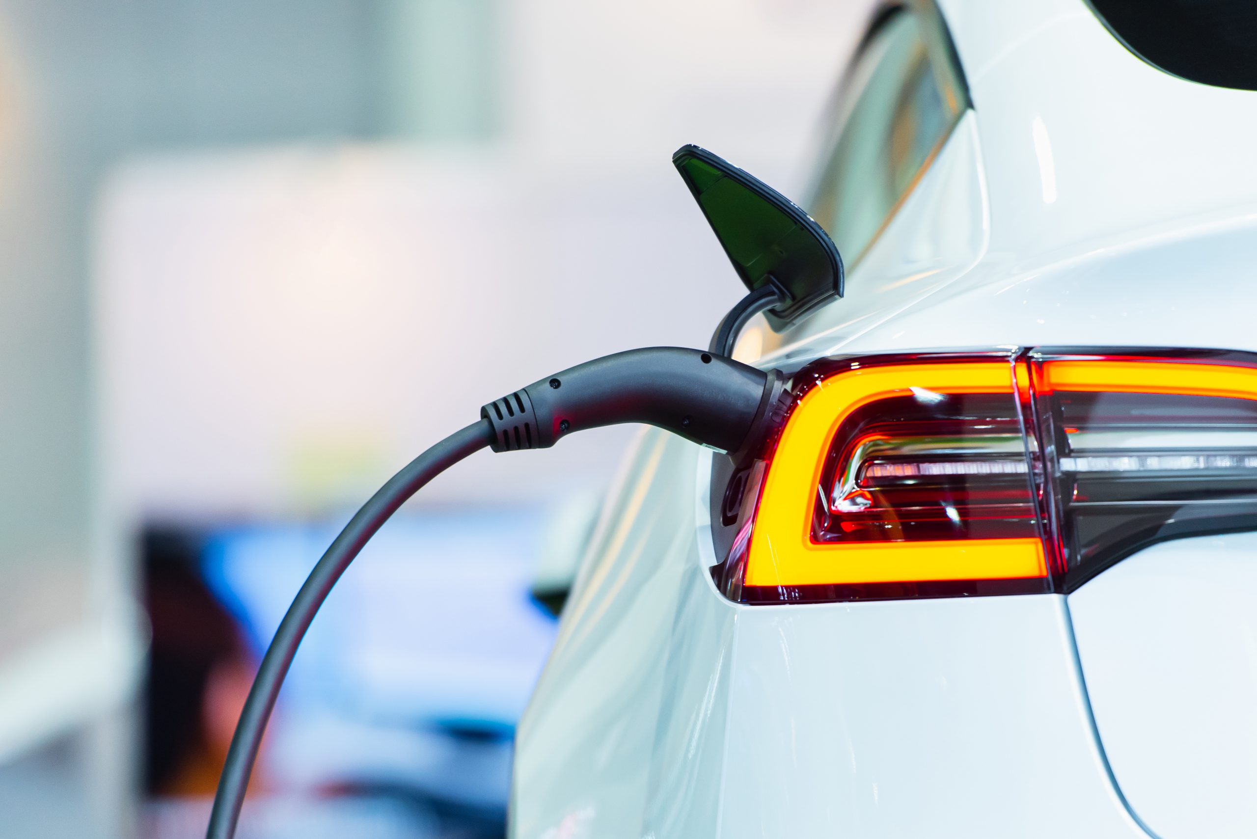 Close up of the Hybrid car electric charger station with power